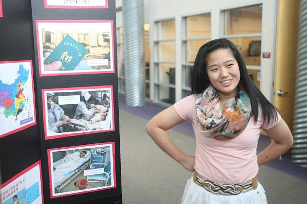 Carson High School sophomore Lisarah Simonson, 16, talks about her project on Friday morning.