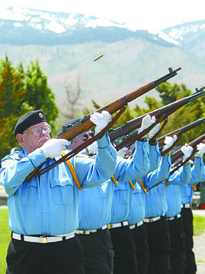 Honor guard members of American Legion Post 56 provide the 21-gun salute at the Memorial Day service at Lone Mountain Cemetery on Monday afternoon. To see additional photos from Memorial Day events, go the photos link on the Nevada Appeal home page.