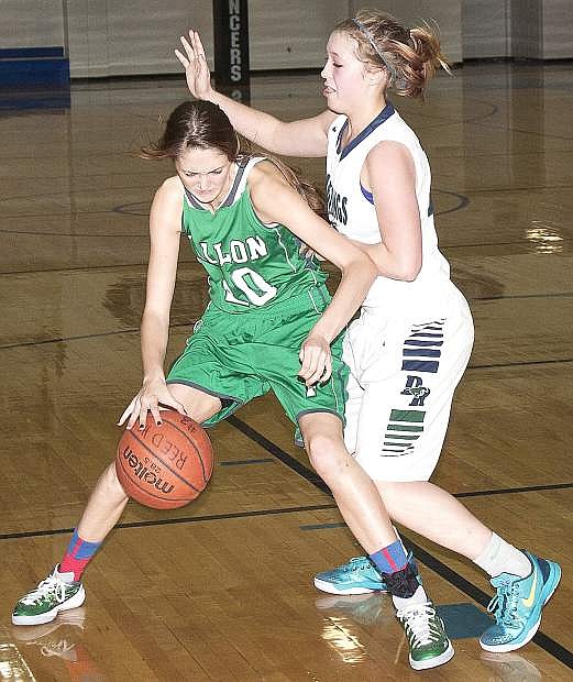 Fallon&#039;s Maggie O&#039;Flaherty drives against Damonte Ranch during the Lady Wave&#039;s 40-36 win on Friday in Reno.