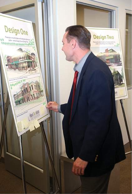 John Rutledge of Carson City makes his choice for the new design of the former CitiBank building on Wednesday.