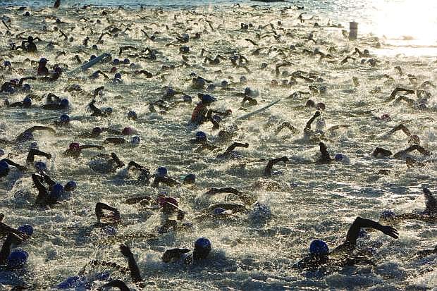 Triathletes hit the water at the start of the 2010 Ford Ironman World Championship in Kailua-Kona, Hawaii. North Lake Tahoe will host California&#039;s first full-distance Ironman triathlon since 2001 this Sunday.