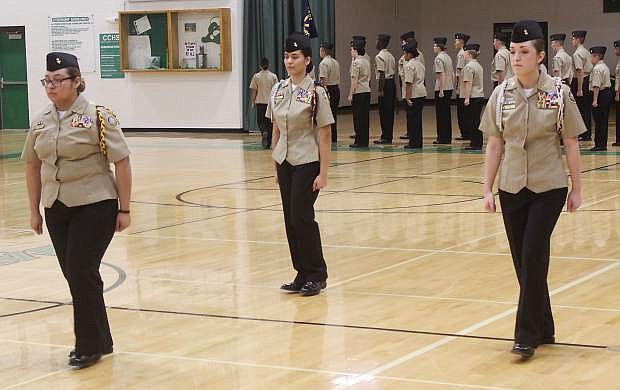 The student command staff include, from left, Mayra Alvarado, Michelle Therianos and Emily Scott, cadet commander.