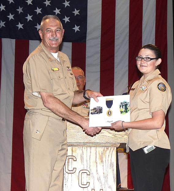 Command Master Chief Donn Sheldon, Naval Science Instructor, and C/PO3 Sarah Inglis received the Military Order of the Purple Heart for Outstanding Leadership potential.