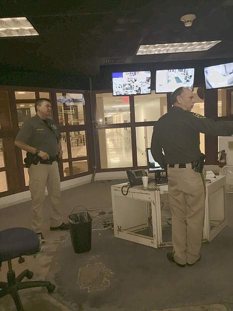 Carson City Sheriff Ken Furlong stands with one of the jail segeants during the remodel of the Carson City jail&#039;s systems. The new system will replace the old control systems for tha jail and put in new touchscreen and updated locking systems.