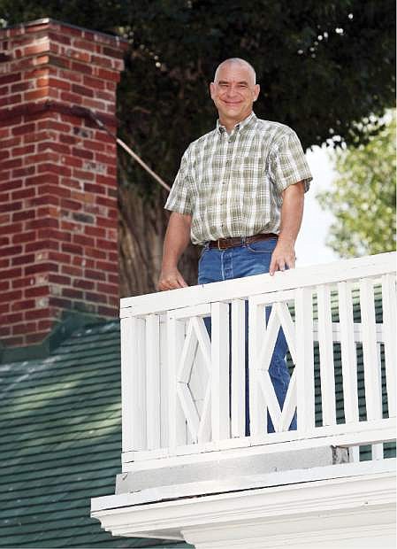 Mark Jensen stands on the east balcony of the Dangberg Ranch Wednesday.
