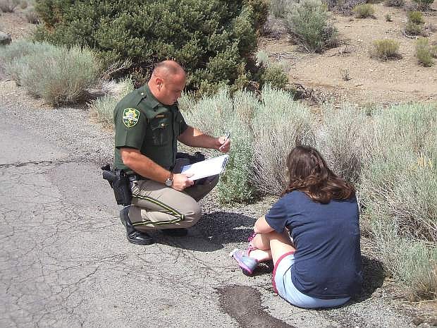 Carson City Sheriff&#039;s Office Deputy Apple speaks with a suspected intoxicated driver.