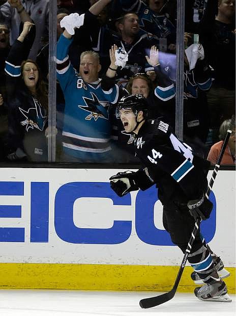 San Jose Sharks&#039; Marc-Edouard Vlasic (44) celebrates after scoring against the Los Angeles Kings during the second period of Game 1 of an NHL hockey first-round playoff series Thursday, April 17, 2014, in San Jose, Calif. (AP Photo/Ben Margot)