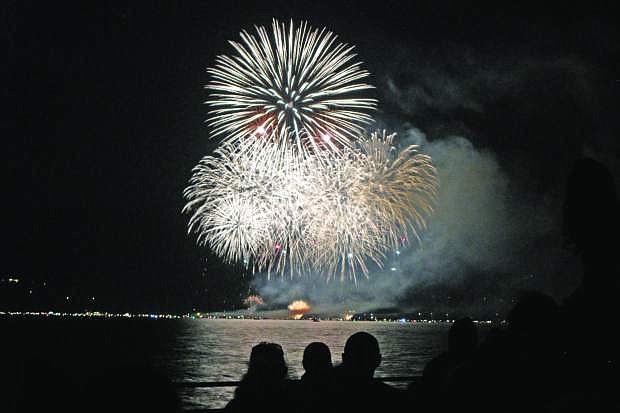 The Fourth of July fireworks are seen from Regan Beach in Lake Tahoe. A Clean Water Act lawsuit filed by two residents of Pine Wild in Marla Bay may force the Lake Tahoe Visitors Authority to pull the plug on its Fourth of July and Labor Day fireworks shows.