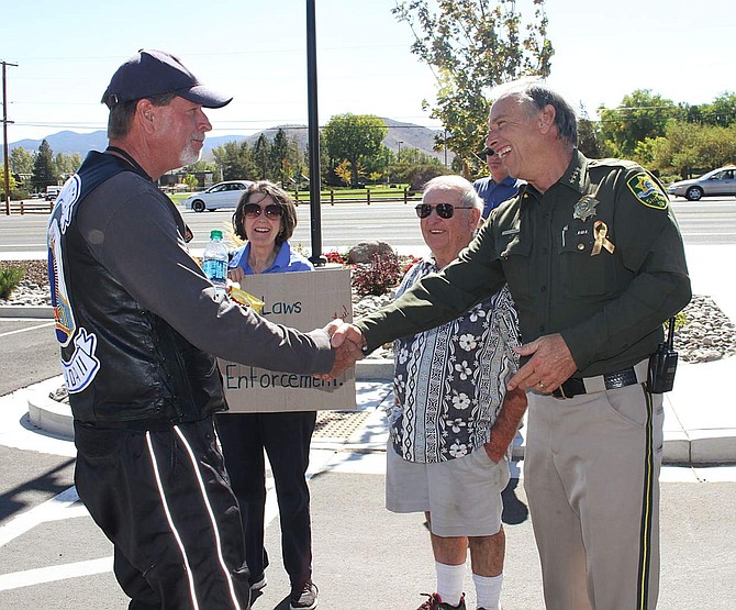 Carson City Sheriff Ken Furlong greets community members at the We Love Our LEOs rally Saturday. The supporters came to show their appreciation for Furlong and the other local law enforcement in Carson City.