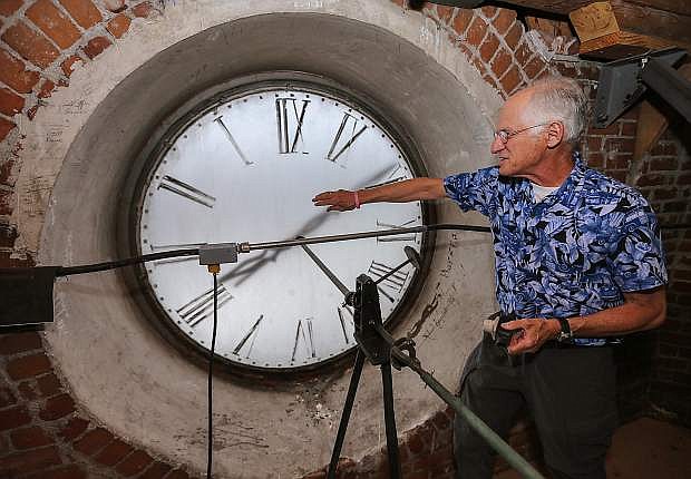 Bob Hartman talks about the clock tower in the Laxalt Building in Carson City, Nev., on Tuesday, June 9, 2015.