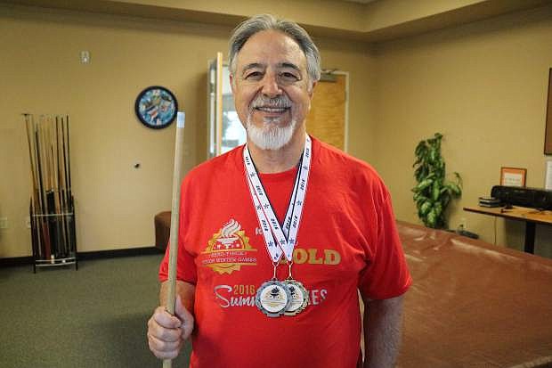 Wayne Lenhares, 71, of Carson City, wins two medals from the billiard competition of the Reno/Tahoe Senior Summer Games.