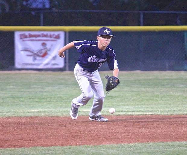 Carson 11-12 All-Star shortstop Kobe Morgan prepares to pick up a grounder Friday night in a game against Reno Continental at Governor&#039;s Field.