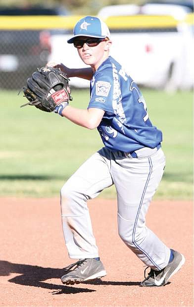 Carson 2nd baseman Jacob Pettay scoops up a grounder in a 4-3 win over Carson Valley on Wednesday.