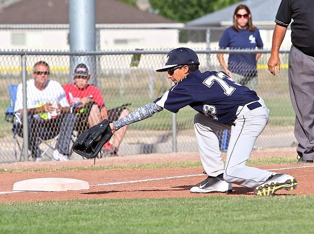 Third baseman Zaid Abdelhady backhands a grounder against South Tahoe Friday at Governor&#039;s Field.