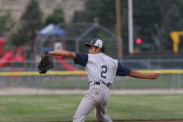 Ethan Good delivers a pitch to a Carson Valley batter on Monday night.
