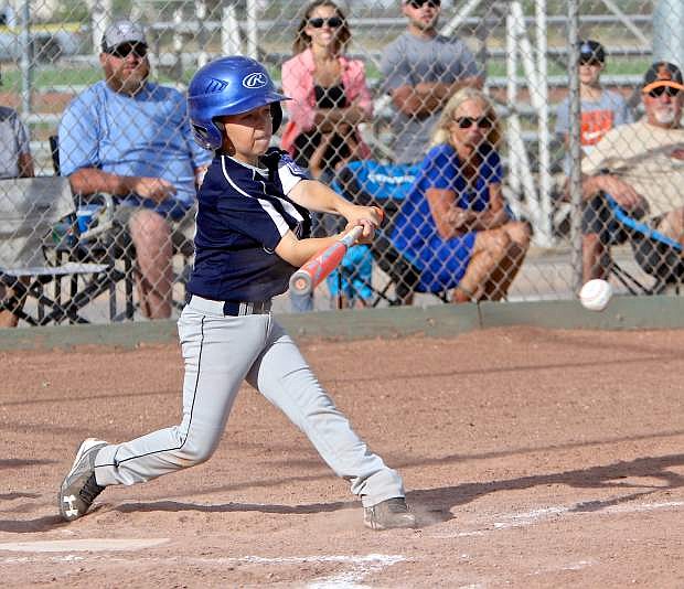 Colin Boekman gets a hit for the Carson 9-10 all stars Friday night.