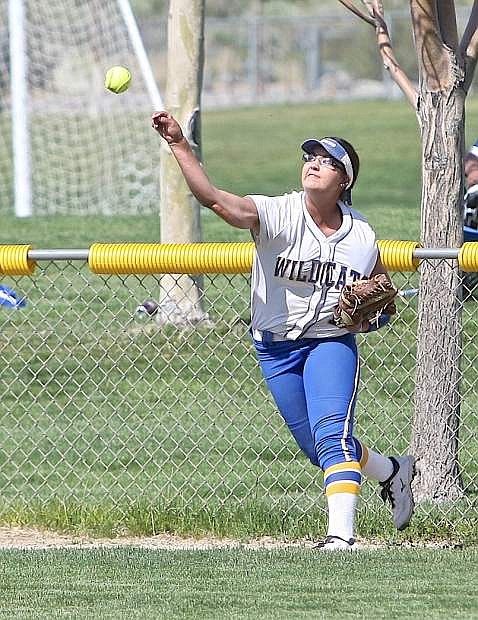 Left fielder Pamela Sakuma fires one back from the fence Friday in a game against the College of Southern Nevada at Edmonds Sports Complex.