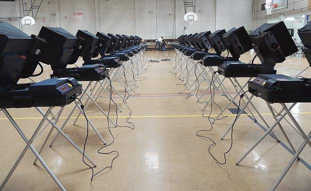 Voting machines are set up at the Carson City Community Center on Monday. Voting takes place for everyone at the Community Center from 7 a.m. to 7 p.m. today.