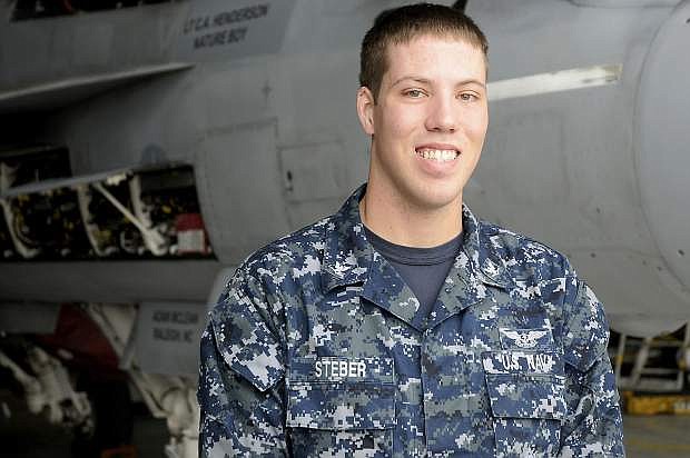 Petty Officer 3rd Class Timothy Steber is with VFA-14 as an aviation electronics technician.