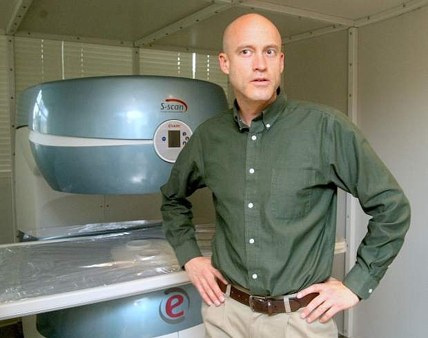 Chris Greenman, an administrator with the Tahoe Fracture and Orthopedic Medical Clinic talks about the new open MRI machine being installed at the facility.
