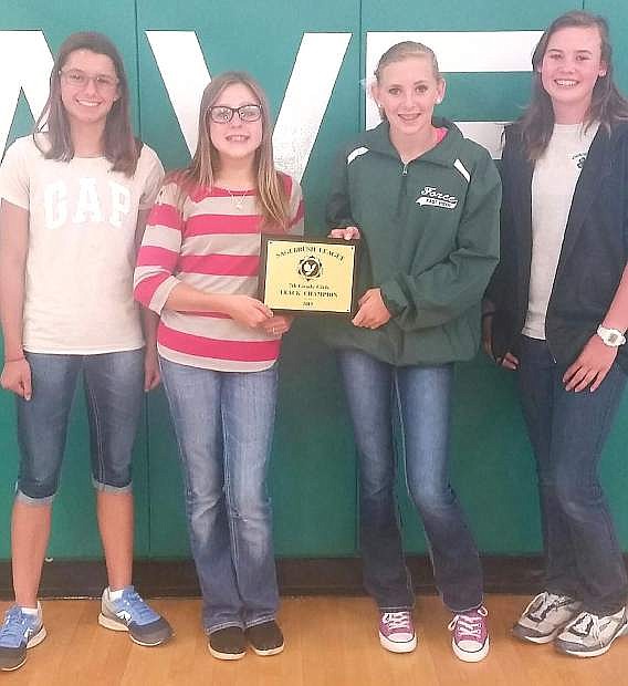 The 4x100-meter relay team from left are Madison Guerrero, Makenna Hanks, Karlee Hitchcock and Tiffany Sorensen set the Churchill County Middle School and Sagebrush Championships record in the event in May.