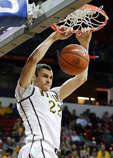 Wyoming&#039;s Larry Nance Jr. dunks during the second half of a Mountain West Conference men&#039;s tournament NCAA college basketball game, Tuesday, March 12, 2013, in Las Vegas. Wyoming won 85-81. (AP Photo/Julie Jacobson)