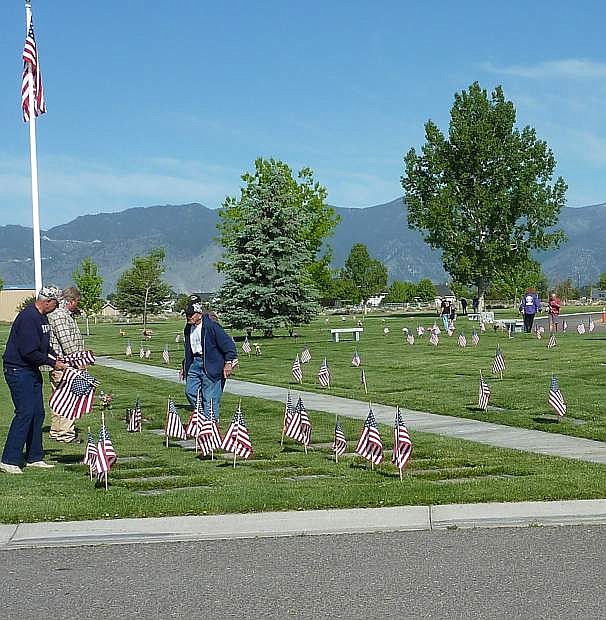 On Friday members of Tahoe-Douglas Elks Lodge 2670 and VFW Post 8583 worked together to place American flags at the graves of all the Veterans at Eastside Memorial Park in Minden. The flags will be removed after Memorial Day.
