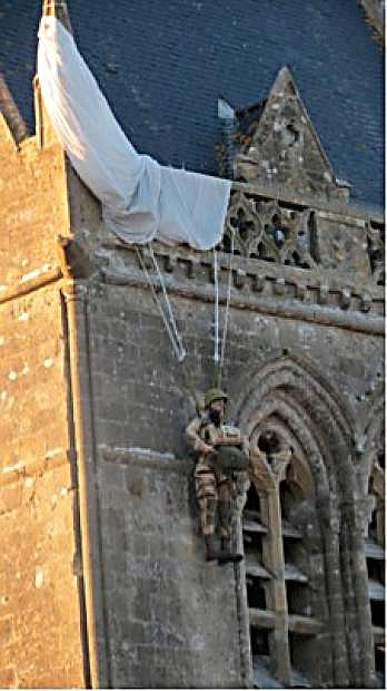 The parachute of one solider, Private John Steele, got caught on a church steeple. Hanging there for hours, Steele was eventually captured by the Germans. He later escaped and rejoined his unit.