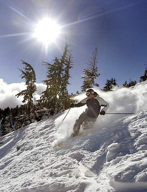 A skier slashes through powder during a previous winter at Mount Rose.