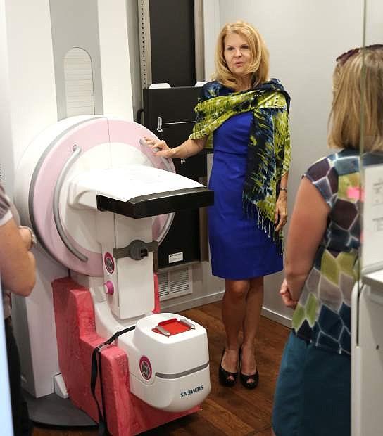 Toni Corbin, vice-president of operations for OptumCare gives a tour of the state-of-the-art mobile health clinic that was in Carson City on Tuesday afternoon.