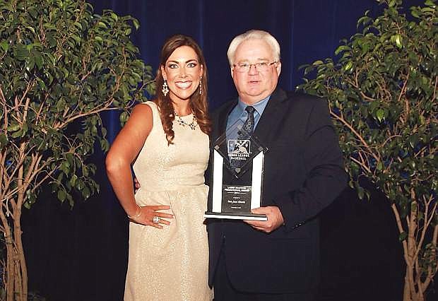 San Jose Giants Chief Marketing Office Juliana Paoli is presented 2014 Larry MacPhail Award from President of Minor League Baseball Pat O&#039;Conner.