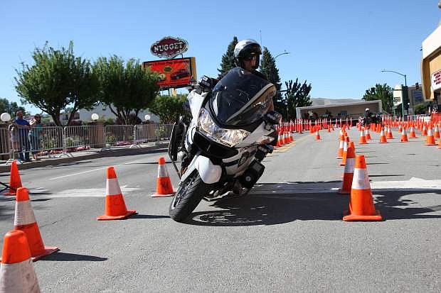 A Citrus Heights Police Department motor officer practices for competition on Friday. The Extreme Motor Officer Training Challenge continues at 8am today in downtown Carson City.