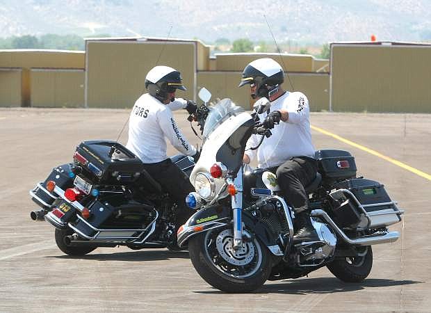 Carson City Sheriff Deputies Gary Denham and Thomas Miller train for the 12th annual Extreme Motor Officer Challenge this weekend.