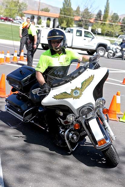 Deputy Matt Smith puts his Harley through its paces earlier this year at Mills Park.The Extreme Motor Officer Training Challenge returns this weekend.