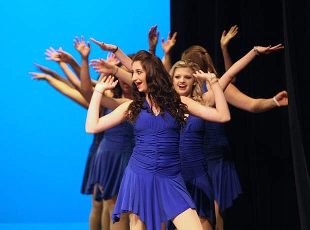 Carson High School musical theater ensemble members sing and dance to &quot;Footloose&quot; at their spring performance at the Carson City Community Center on Tuesday night. The high school&#039;s choral program spring performance continues tonight starting at 7 p.m. at  the community center.