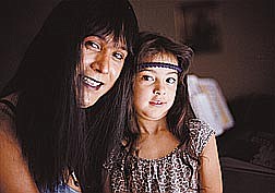 Ric GunnGale Revilla and her daughter Morning Star stand near the keyboard set up in the living room of their Carson City townhouse. Revilla is among the five finalists for the Native American Music Awards.