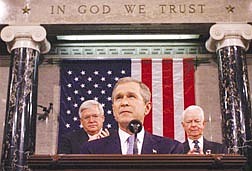 President Bush addresses a Joint Session of Congress on Capitol Hill in Washington Thursday, Sept. 20, 2001. Sitting behind Bush is Sen. Robert Byrd, D-W.Va., president pro-tem of the Senate, right, and  House Speaker Dennis Hastert, R-Ill. (AP Photo/Win McNamee, Pool)