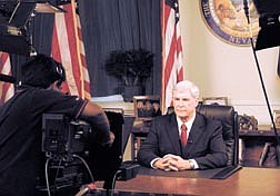 Nevada Governor Kenny Guinn prepares to address Nevadans on the State of the Economy from his office at the Capitol in Carson City Nevada on Thursday September 28th, 2001.  (AP Photo /Rick Gunn, Nevada Appeal)