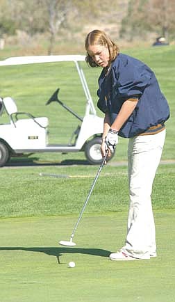 Gabrielle Gallegos putts on the 5th green at Eagle Valley Golf Course Tuesday afternoon. photo by Rick Gunn.