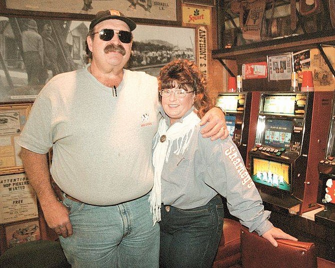 Nevada Appeal News ServiceAt left, son of Milos &#039;Sharkey&#039; Begovich, Butch, stands with his sister, Mashelle, inside what was their father&#039;s casino in downtown Gardnerville, Sharkey&#039;s Nugget. Sharkey&#039;s changed owners on New Year&#039;s Day.