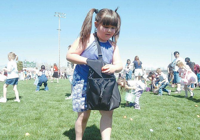 Photo by Brian CorleyAlexis Letender, 5, races to gather eggs at the Carson City Jaycees 26th annual Easter Egg Hunt at Governor&#039;s Field on Sunday. Alexis picked up an egg that was specially died to win a new bicycle. Each age group had winning eggs for similar prizes that were donated.