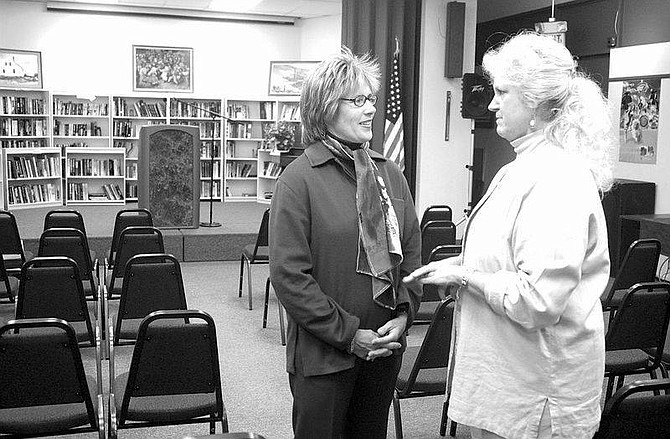 Photo by Cathleen AllisonOlympian and National Public Radio personality Diana Nyad, left, talks with Carson City Library Director Sally Edwards, in the library auditorium on Monday night. Nyad&#039;s visit was one of many activities marking National Library Week. The theme is Travel the World@Your Library and events marking this occasion are continuing.