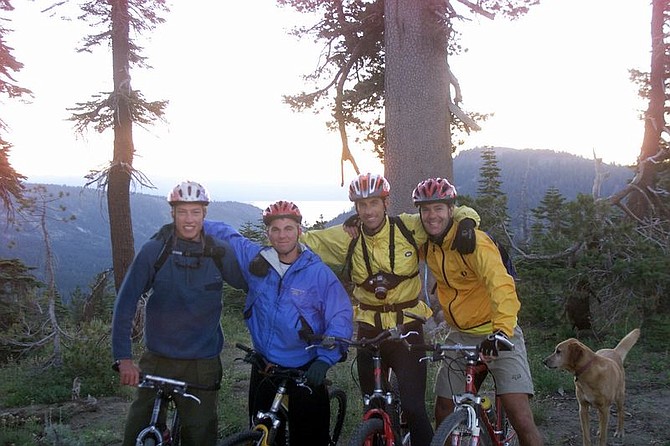 Nevada newsmen, from left, Karl Horeis, Jeremy Evans, Rick Gunn and K.M. Cannon pose on the Tahoe Rim Trail near Tahoe City 16 miles into Day Two of a 10-day athletic challenge Tuesday, Aug. 6, 2002. The day included 40 miles of mountain biking and 12 miles of hiking. Day Two ended at Tahoe Meadows on Mount Rose Hwy.  Photo by Izzy Luna