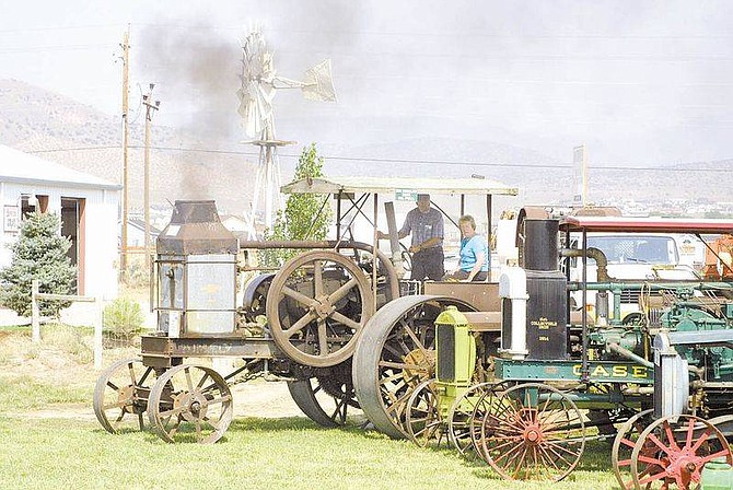 Photo by Cathleen AllisonBill and Dorine Ramsden park a 1911 Rumley 15/30 oil pull tractor into line in preparation for Antique Engine and Tractor Show, which will be held this weekend in the Carson Valley. Thousands are expected to attend this annual event, now in its seventh year.