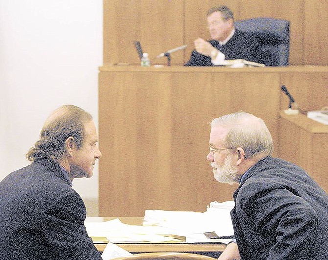 Defense attorneys, Lawrence Lichter and Day Williams confer Wednesday during jury selection in the murder trial of their client Rocky Boice Jr.