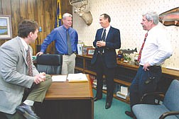 Carson City Sheriff-elect Kenny Furlong, center, talks with his new appointees, from left, Chief Deputy of Administrative Services Rick Keema, Chief Deputy of Operations Steve Schuette and Undersheriff Steve Albertsen.