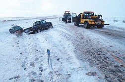 Highway 395 in Washoe Valley was closed Friday afternoon after a  multi-car accident.  The highway was intermittently covered with ice and snow. &#124; Photo by Rick Gunn