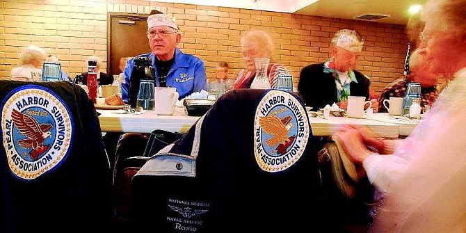 BRAD HORN/Nevada Appeal Bill McAdams, left, sits with his wife Sue, during the Pearl Harbor Survivors Association&#039;s annual breakfast at Grandma Hattie&#039;s Restaurant in Carson Sunday morning.