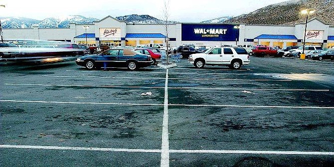 BRAD HORN/Nevada Appeal Wal-Mart shoppers try to get a head start at 6:30 a.m. Saturday morning at the Douglas store.