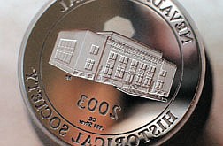 Pictured above is the die used to create the new Nevada Historical Society 2003 coin. On the coin is the former Supreme Court and Library building which went on to become the Attorney Generals office across from the Capitol grounds..